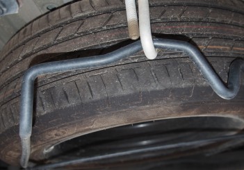 spare tyre hooked to undercarriage